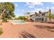 Expansive backyard with gravel ground cover and sparkling private pool is perfect for outdoor enjoyment at 6612 Elton Ave, Las Vegas, NV 89107