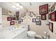 Bathroom featuring a vanity, toilet and quirky decorations at 6612 Elton Ave, Las Vegas, NV 89107