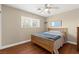 Bedroom featuring wood floors and a ceiling fan at 6612 Elton Ave, Las Vegas, NV 89107