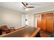 Bedroom featuring wood floors, a ceiling fan, and a closet at 6612 Elton Ave, Las Vegas, NV 89107