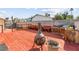 A spacious deck with seating area features a charming fire pit perfect for outdoor entertaining and relaxation at 6612 Elton Ave, Las Vegas, NV 89107
