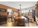 Inviting dining room featuring a classic wooden table with a bright window view at 6612 Elton Ave, Las Vegas, NV 89107