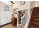 Entryway featuring wooden floors, wooden stairs, and decorative accents at 6612 Elton Ave, Las Vegas, NV 89107