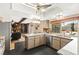 Well-appointed kitchen with backyard pool view, stainless steel appliances, and granite countertops at 6612 Elton Ave, Las Vegas, NV 89107