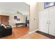 Bright living room with hardwood floors and natural light streaming through the entryway at 6612 Elton Ave, Las Vegas, NV 89107