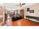 Spacious living room with hardwood floors and seamless access to the dining area at 6612 Elton Ave, Las Vegas, NV 89107