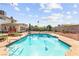A pristine in-ground pool is surrounded by lush greenery and offers a refreshing oasis for relaxation and recreation at 6612 Elton Ave, Las Vegas, NV 89107
