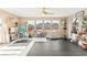 Bright sunroom filled with natural light from large windows overlooking the backyard at 6612 Elton Ave, Las Vegas, NV 89107