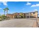 Beautiful home with grand driveway, desert landscaping, porte-cochere, and a three-car garage at 670 Du Fort Ave, Henderson, NV 89002