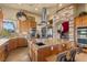 Spacious kitchen with island, stainless steel appliances, granite countertops, and designer touches throughout at 670 Du Fort Ave, Henderson, NV 89002