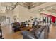 Spacious living room features high ceilings, elegant furnishings, and plenty of natural light at 670 Du Fort Ave, Henderson, NV 89002