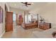 Spacious main bedroom with canopy bed and wood furniture at 670 Du Fort Ave, Henderson, NV 89002