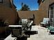 Outdoor patio area with comfortable seating and a barbecue grill, perfect for entertaining at 682 Corte Madera Ave, Henderson, NV 89015