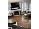 Top-down view of a well-appointed living room with fireplace and stylish decor at 682 Corte Madera Ave, Henderson, NV 89015
