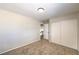 Bedroom with closet and carpeted floor at 7633 Raven Hills Dr, Las Vegas, NV 89149