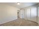Comfortable bedroom with closet, carpeted floor, and neutral color scheme at 7633 Raven Hills Dr, Las Vegas, NV 89149