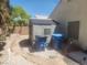 Backyard with storage shed, trash cans and desert landscaping at 7657 Velvet Mist St, Las Vegas, NV 89131