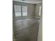 Spacious bedroom featuring wood-style flooring and ample sunlight at 7977 Delft Blue St, Las Vegas, NV 89139