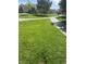 Green space featuring sidewalks and grass for the community at 7977 Delft Blue St, Las Vegas, NV 89139