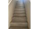 Interior shot showing a well-maintained staircase with wood-style steps at 7977 Delft Blue St, Las Vegas, NV 89139