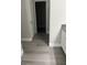 View of the walk-in closet and wood-look floors in a spacious room at 7977 Delft Blue St, Las Vegas, NV 89139
