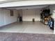 A spacious garage with an epoxy floor and ample storage space at 80 Cathedral Wash Pl, Henderson, NV 89011