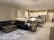 Bright open living area with a modern kitchen and inviting decor at 80 Cathedral Wash Pl, Henderson, NV 89011