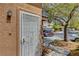 The home's entry has a security door, well maintained yard and inviting curb appeal at 8048 Astrology Ct # 201, Las Vegas, NV 89128