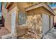 The building's exterior features a gated entrance, a front window and access to the garage at 8048 Astrology Ct # 201, Las Vegas, NV 89128