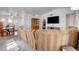 Spacious living room with a dining area, neutral walls, and open concept layout at 8048 Astrology Ct # 201, Las Vegas, NV 89128