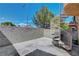 Outdoor patio with concrete pavers, a barbecue grill, and a unique spiral staircase at 8048 Astrology Ct # 201, Las Vegas, NV 89128