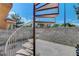 Outdoor patio features a concrete foundation and a modern spiral staircase at 8048 Astrology Ct # 201, Las Vegas, NV 89128