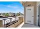 Balcony area featuring a building view, railing and an exterior door at 8070 W Russell Rd # 2052, Las Vegas, NV 89113
