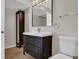 Bathroom vanity with sink, large mirror, towel bar, and lighting fixture at 8070 W Russell Rd # 2052, Las Vegas, NV 89113