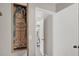 Hallway view with a built in ironing board and access to living spaces at 8070 W Russell Rd # 2052, Las Vegas, NV 89113