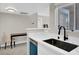 Updated kitchen with stainless steel appliances, modern sink, and white countertops at 8070 W Russell Rd # 2052, Las Vegas, NV 89113