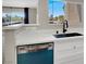 Updated kitchen with stainless steel appliances, modern sink, and white countertops at 8070 W Russell Rd # 2052, Las Vegas, NV 89113