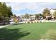 Community park featuring lush landscaping, picnic tables and a pool at 8084 Bosco Bay Ave, Las Vegas, NV 89113