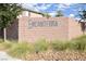 Encanterrra community sign surrounded by desert landscaping and greenery at 8084 Bosco Bay Ave, Las Vegas, NV 89113