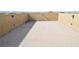 Spacious rooftop patio with stucco walls offering views of the surrounding landscape at 8084 Bosco Bay Ave, Las Vegas, NV 89113