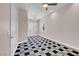 This bedroom has neutral paint and a unique patterned carpet at 87 E Agate Ave # 403, Las Vegas, NV 89123