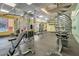 Well-equipped gym with various exercise machines and a spiral staircase at 87 E Agate Ave # 403, Las Vegas, NV 89123