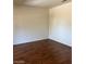 An empty bedroom with light walls and laminate hardwood flooring at 9000 Las Vegas Blvd # 2189, Las Vegas, NV 89123