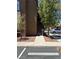 Apartment building exterior with staircase, landscaping, and parking spot visible in the foreground at 9000 Las Vegas Blvd # 2189, Las Vegas, NV 89123