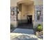 Front entrance of community building featuring tile walls, light fixtures and glass door at 9000 Las Vegas Blvd # 2189, Las Vegas, NV 89123