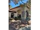 Exterior shot of community clubhouse with rocks and shade trees at 9000 Las Vegas Blvd # 2189, Las Vegas, NV 89123