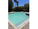 Large community pool with blue tile trim and brick decking at 9000 Las Vegas Blvd # 2189, Las Vegas, NV 89123