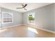 Bright bedroom with hardwood floors, neutral paint, and two windows at 915 Melrose Dr, Las Vegas, NV 89101