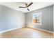 Cozy bedroom with hardwood floors, bright natural light, and neutral paint at 915 Melrose Dr, Las Vegas, NV 89101