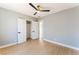 Bedroom featuring hardwood floors, walk-in closet, and neutral paint at 915 Melrose Dr, Las Vegas, NV 89101